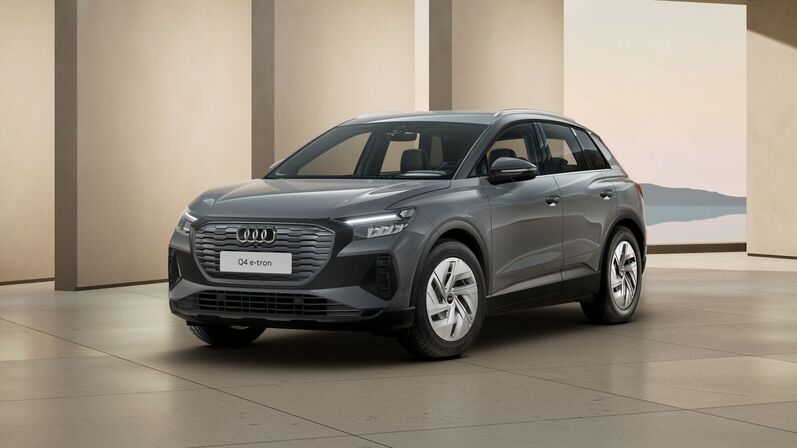 Audi Q4 e-tron in Grau mit LED-Scheinwerfer.