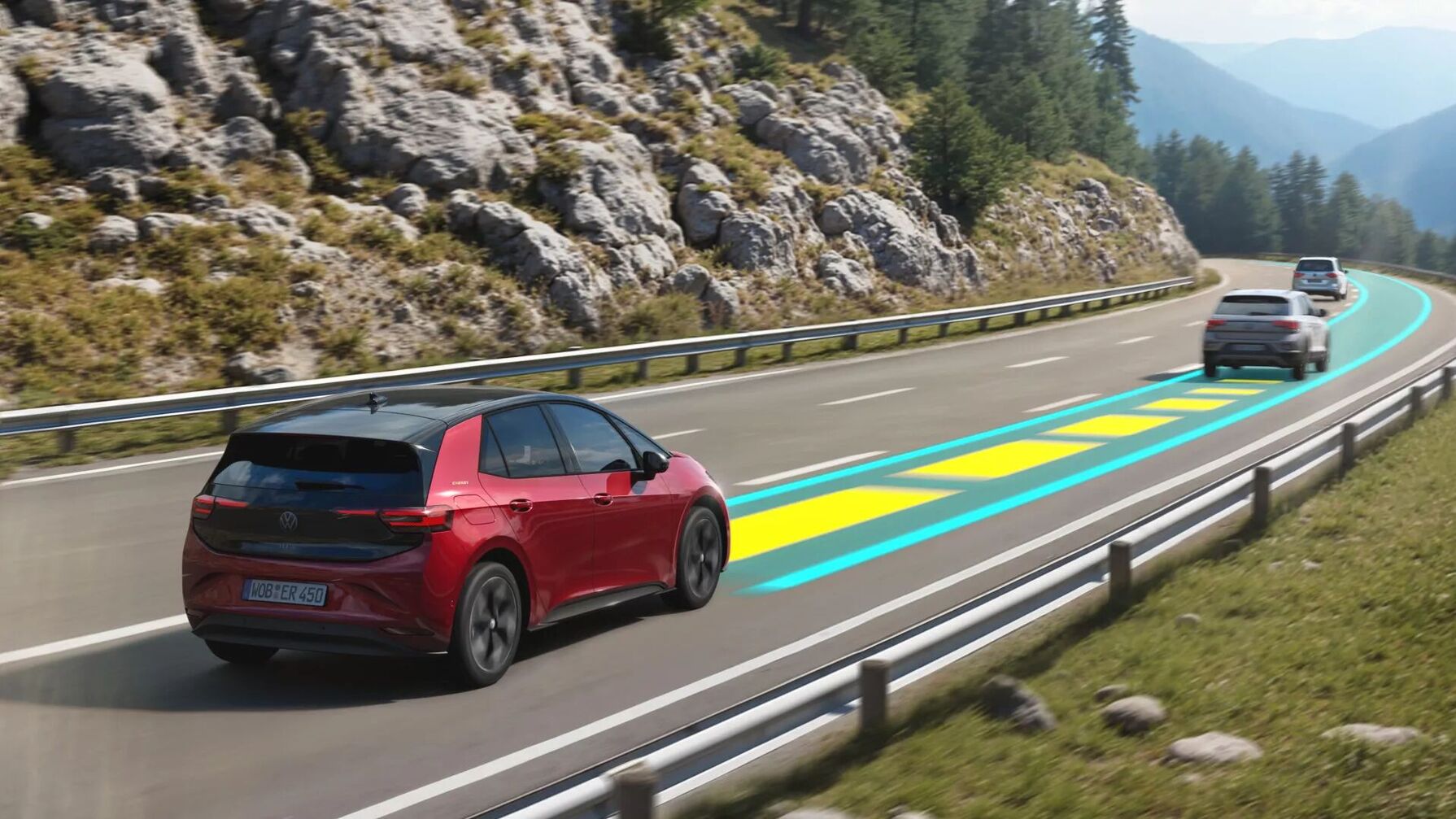 Ein roter ID.3 ENERGY folgt automatisch der Fahrspur auf einer kurvigen Bergstraße, visualisiert durch farbige Fahrspur-Markierungen.