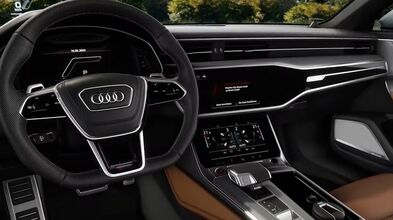 Modernes RS-Cockpit mit Multifunktionslenkrad, digitalen Displays und edlen Materialien im sportlich-eleganten Design.