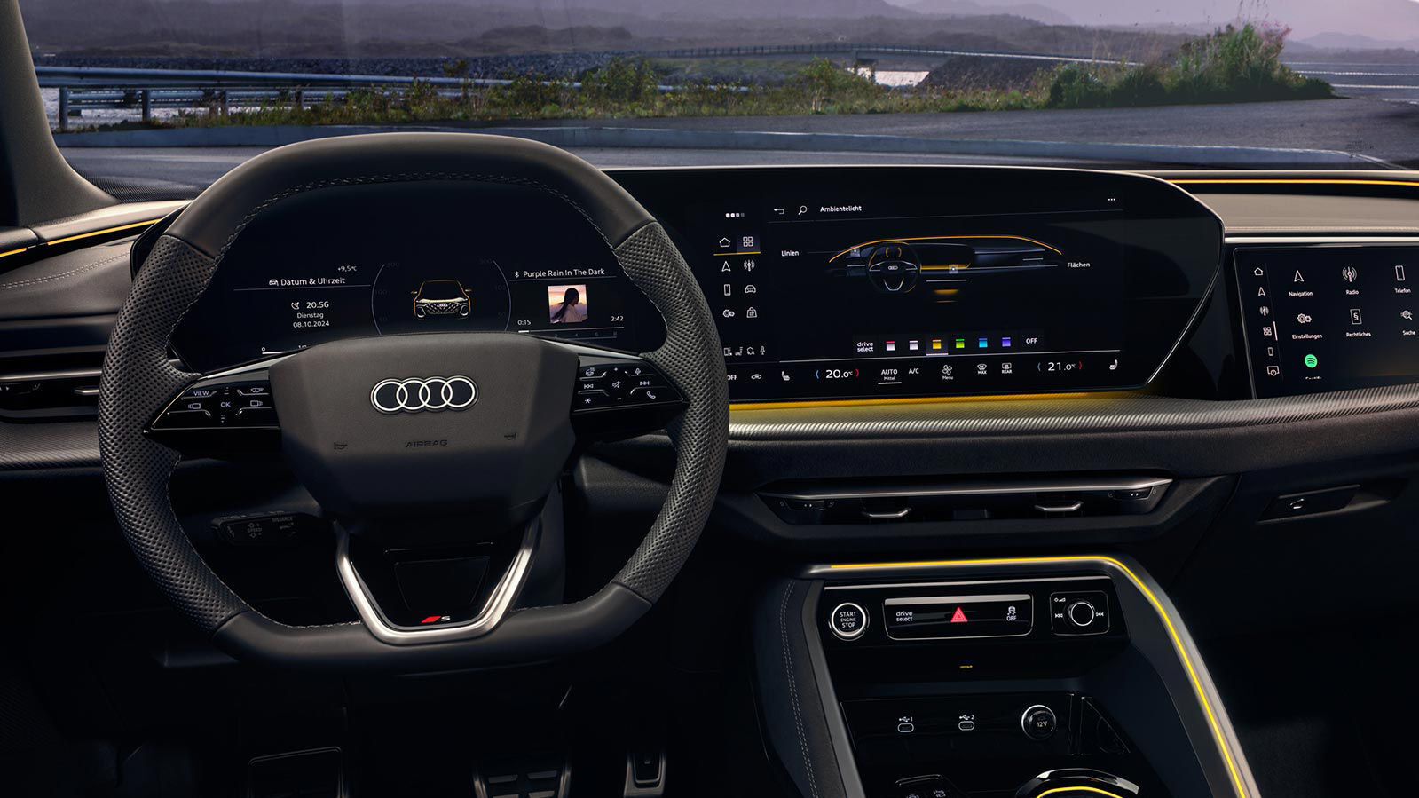 Fahrerperspektive im Audi Q5 Sportback mit volldigitalem Kombiinstrument, großem Zentraldisplay, 3-Zonen-Klimaautomatik und sportlichem S-Lenkrad im 3-Speichen-Design.